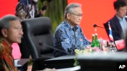 Thailand's Foreign Minister Don Pramudwinai, center, attends the Association of Southeast Asian Nations (ASEAN) foreign ministers retreat in Jakarta, Indonesia, Saturday, Feb. 4, 2023.