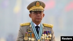 Myanmar's junta chief Senior General Min Aung Hlaing, who ousted the elected government in a coup on February 1, presides an army parade on Armed Forces Day in Naypyitaw, Myanmar, March 27, 2021.