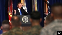 President Donald Trump speaks at Fort Myer in Arlington Va., Monday, Aug. 21, 2017, during a Presidential Address to the Nation about a strategy he believes will best position the U.S. to eventually declare victory in Afghanistan. (AP Photo/Carolyn Kaster)