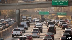 FILE - This Dec. 12, 2018, file photo shows traffic on the Hollywood Freeway in Los Angeles. 