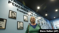 In this May 6, 2019, photo, Marguerite Cottrell, sister of John Reynolds, speaks during an interview at a recently opened tribute center for the Bedford Boys in Bedford, Virginia. 