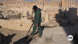 Landmines slow return to Palmyra, Syria, home of famed ancient ruins 