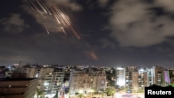 Israel's Iron Dome anti-missile system intercepts rockets, as seen from Ashkelon, Israel, Oct. 1, 2024.