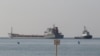 The cargo ship Polarnet leaves the sea port in Chornomorsk