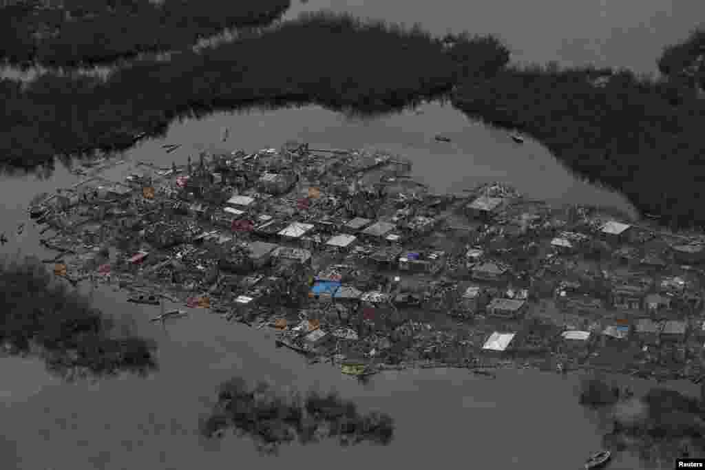 Destroyed houses are seen in a village after Hurricane Matthew passes Corail, Haiti, Oct. 6, 2016. 