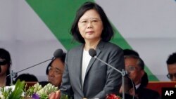 Taiwan's President Tsai Ing-wen delivers a speech during the National Day celebrations in front of the Presidential Building in Taipei, Taiwan, Tuesday, Oct. 10, 2017. 