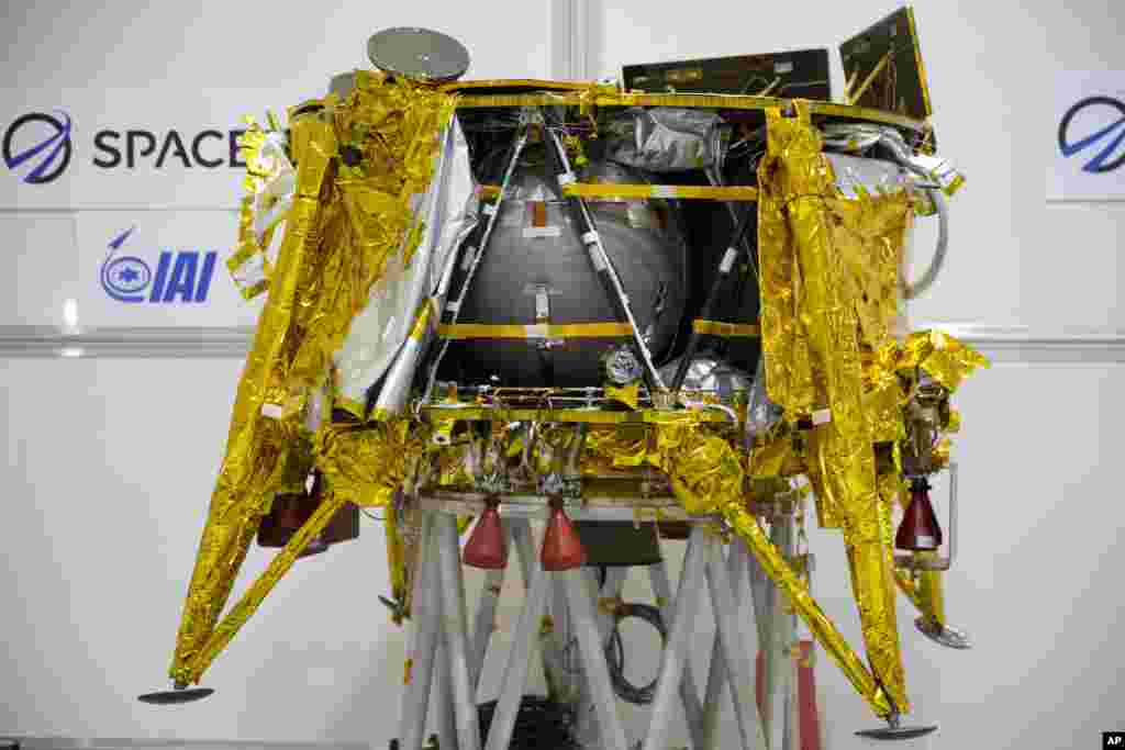 This Dec. 17, 2018 file photo shows the SpaceIL spacecraft Beresheet in a special "clean room" during a press tour near Tel Aviv, Israel. (AP Photo/Ariel Schalit, File)