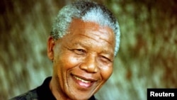 FILE PHOT0 AUG96 - President Nelson Mandela will celebrate his 80th birthday on July 18. Events planned around the country are due to run for at least a month and include celebratory parties for underpriveleged children, as well as concerts featuring loca