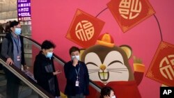 香港许多民众近日来戴口罩上街（美联社2020年1月21日）