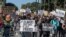 Social workers join Black Lives Matter members during a demonstration against racism and police brutality, outside City Hall in Los Angeles, California on June 13, 2020. - Demonstrations are being held across the US following the death of George Floyd on May 25, 2020, while being