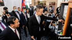 Hungarian foreign minister Peter Szijjarto and Cambodian foreign minister Prak Sokhonn during the inaugural ceremony of Hungary's embassy office in Phnom Penh, Cambodia, November 03, 2020. (Facebook Page: Peter Szijjarto) 