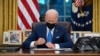 US President Joe Biden signs executive orders related to immigration 