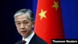 រូបឯកសារ៖ លោក Wang Wenbin អ្នក​នាំពាក្យ​ក្រសួង​ការបរទេស​ចិន ថ្លែងនៅក្នុងសន្និសីទសារព័ត៌មានមួយនៅទីក្រុងប៉េកាំង ប្រទេសចិន កាលពីថ្ងៃទី ៣០ ខែកក្កដា ឆ្នាំ២០២០។