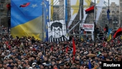Supporters of former Georgian President Mikheil Saakashvili hold a rally in central Kyiv, Ukraine, Dec. 10, 2017.