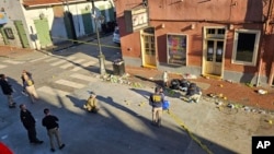 FBI agents work on Bourbon Street on Jan. 1, 2025, near the Four Points by Sheraton hotel in the French Quarter of New Orleans.