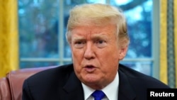 Rais wa Marekani Donald Trump akiwa White House mjini Washington, Dec. 11, 2018. 