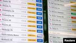 Passengers wait for the resumption of flights at O'Hare International Airport