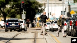 Law enforcement officers respond to the scene of a shooting at a Santa Clara Valley Transportation Authority (VTA) facility on Wednesday, May 26, 2021, in San Jose, California.