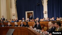 Members of the U.S. House Judiciary Committee vote to approve two articles of impeachment against U.S. President Donald Trump on Capitol Hill in Washington, U.S., December 13, 2019. 