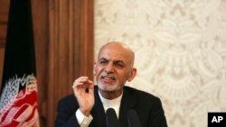 An injured demonstrator is been helped by another after clashing with riot police during the so-called "mother of all marches" against Venezuela's President Nicolas Maduro in Caracas.