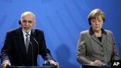 رئیس جمهور غنی و انگلا مرکل، صدراعظم آلمان در برلین