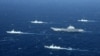 Formasi angkatan laut China selama latihan militer di Laut China Selatan. Pada 27 Januari 2021, China memulai tiga hari latihan militer di perairan yang disengketakan. (Foto: AFP)