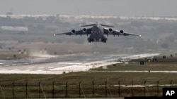 FILE - U.S. Air Force plane takes off from the Incirlik air base, in southern Turkey.