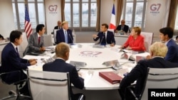 នេះ​ជា​រូបភាព​នៃ​កិច្ចប្រជុំ​កំពូល G7 នៅ​ក្នុង​ក្រុង Biarritz ប្រទេស​បារាំង កាលពី​ថ្ងៃទី២៥ ខែសីហា ឆ្នាំ២០១៩។