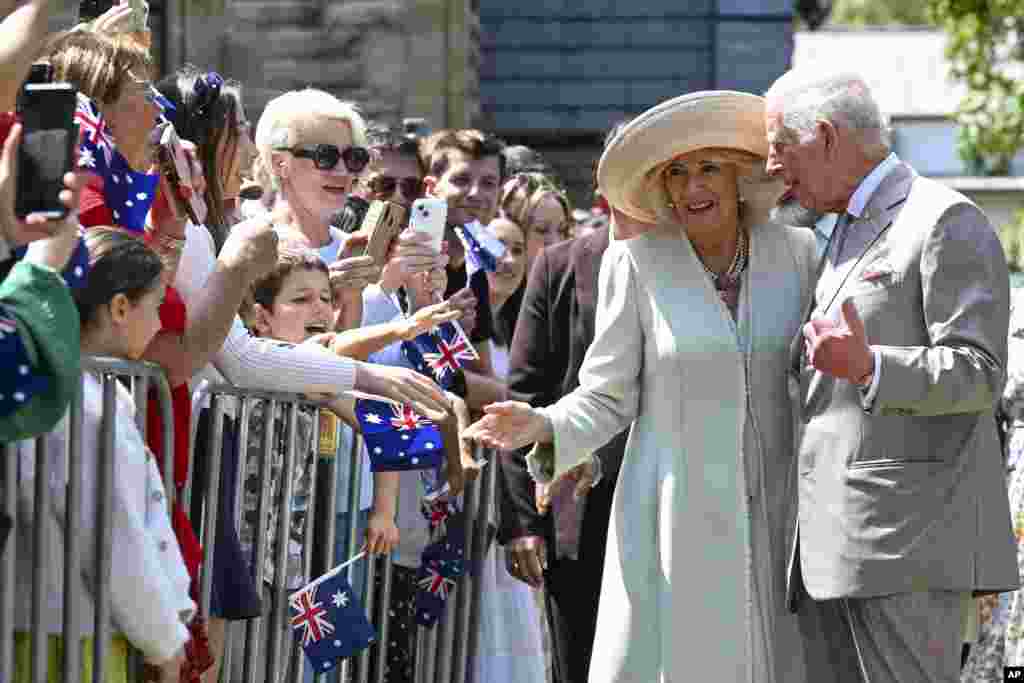 Britain's King Charles and Queen Camilla greet well wishers as they leave St Thomas' Anglican Church in Sydney, Australia.