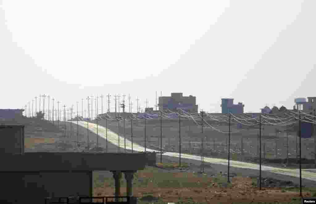 A view of the town of Snoun that was recently seized by Islamic State militants, as seen from Dukra village, Aug. 11, 2014.