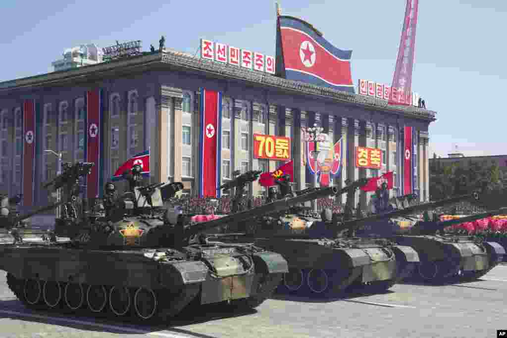 North Korean tanks roll past during a parade for the 70th anniversary of North Korea's founding day in Pyongyang, North Korea, Sept. 9, 2018. 