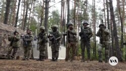 Ukrainian women juggle military service and civilian life