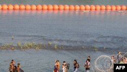 2023年7月16日，德州伊格爾帕斯的美墨邊境的移民。