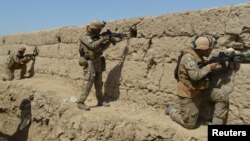 Afghan security forces take position during a battle with the Taliban in Kunduz province, Afghanistan September 1, 2019. REUTERS 